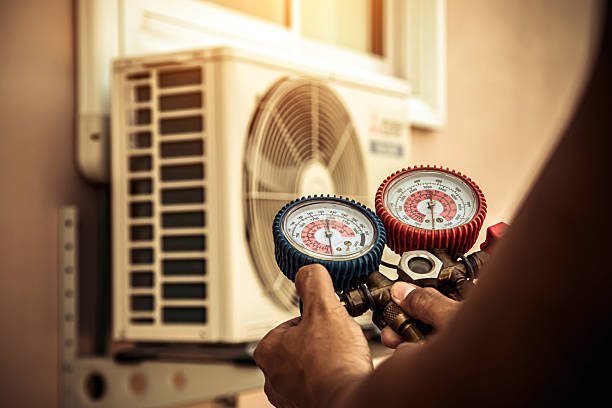 Professional Air Conditioning Service technician working in Benson, MD